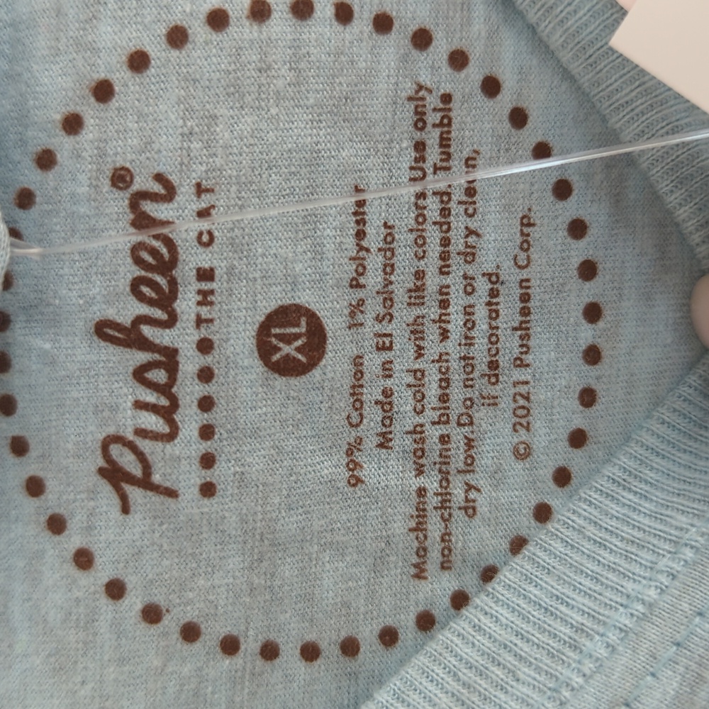NWOT Pusheen Light Blue Short Sleeve Tee with Pastel Dessert Graphic. - Picture 2 of 3